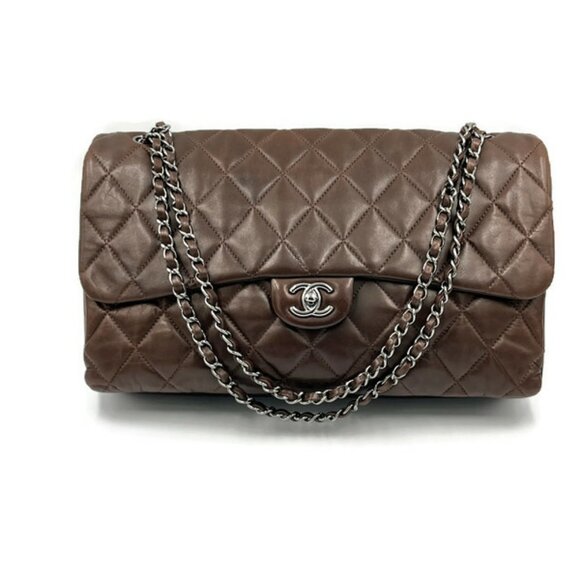 CHANEL Handbags - ❗️Sold❗️Chanel Lambskin flap Maxi size Flap - Brown